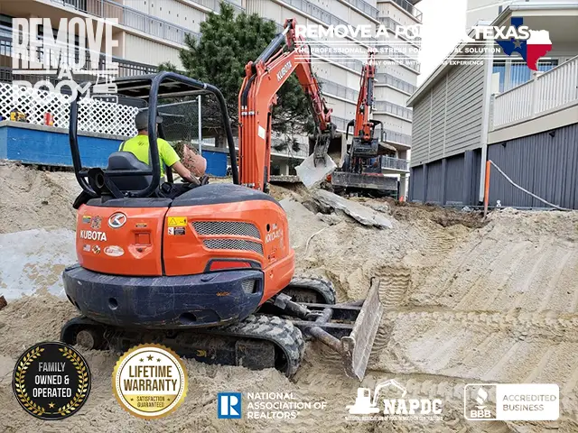 Step 11 - Excavator moving large rocks and beginning pool fill-in - Remove A Pool Dallas Fort-Worth Texas - Remove A Pool DFW