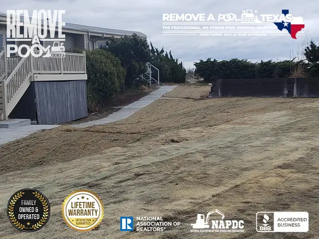 Step 21 - Applying wheat straw over newly seeded areas in the pool removal site - Remove A Pool Dallas Fort-Worth Texas - Remove A Pool DFW